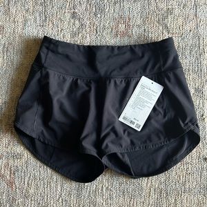Lululemon speed up shorts mid rise 4 inch inseam black size 4